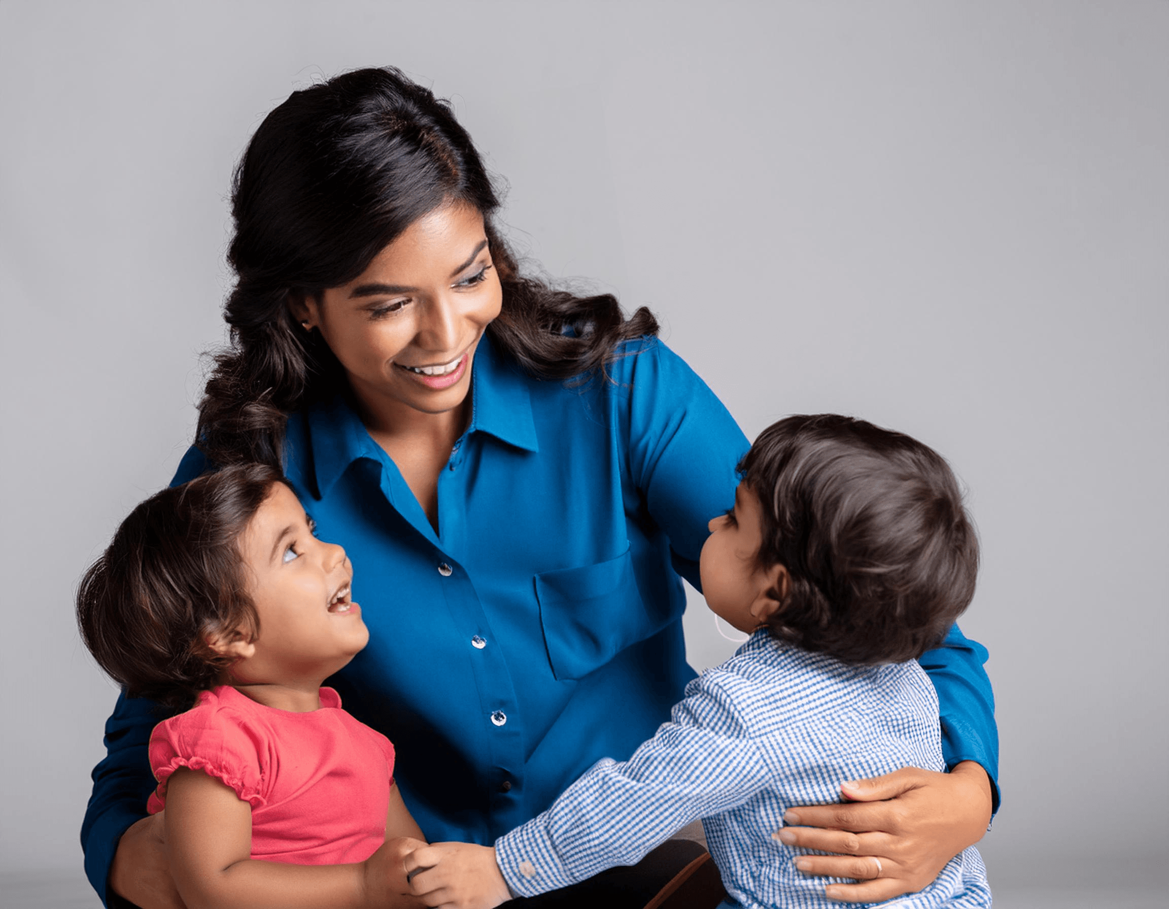 Happy family with childcare provider